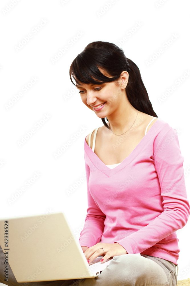 Young woman using laptop isolated on white. Top view.