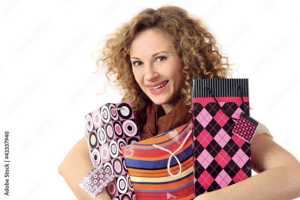 Portrait of an attractive young woman with shoppingbags