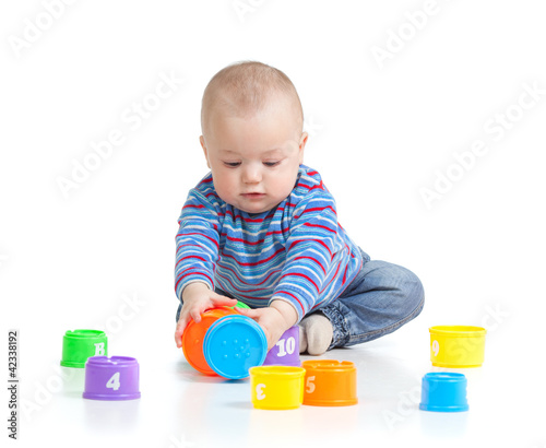 Funny little child playing ...