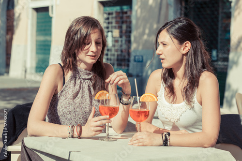 Two Young Women with a Cold Drink
