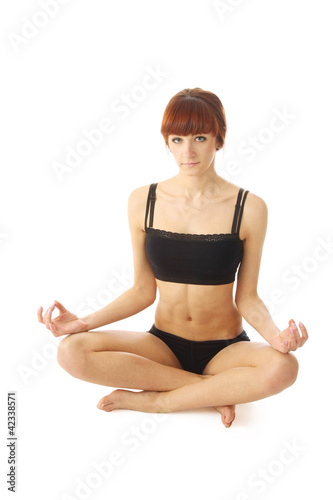 A young woman doing yoga