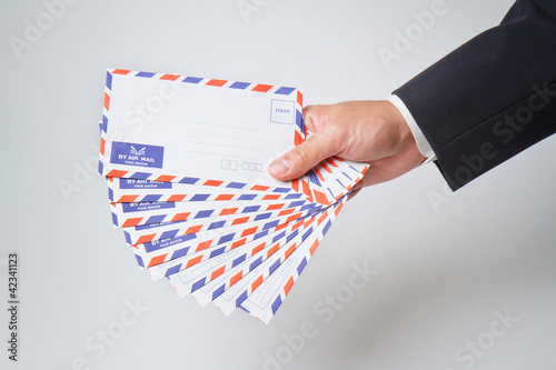 Businessman holding  envelope