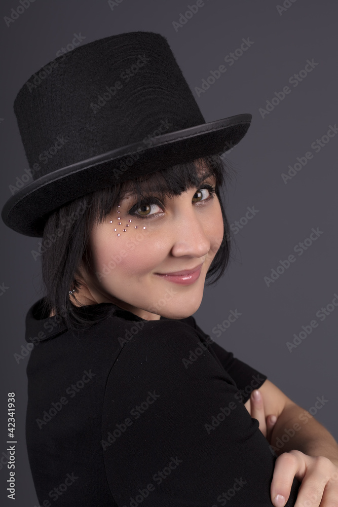 Beautiful Girl with her felt hat smiling Beautiful Girl with her felt hat smiling