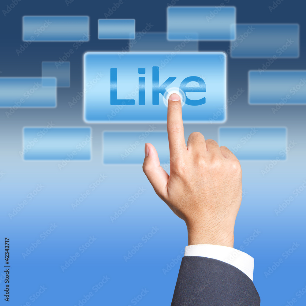 pushing Like button on a touch screen interface pushing Like button on a touch screen interface