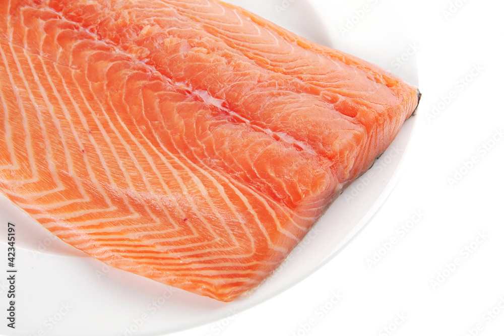 salmon fillet on white plate