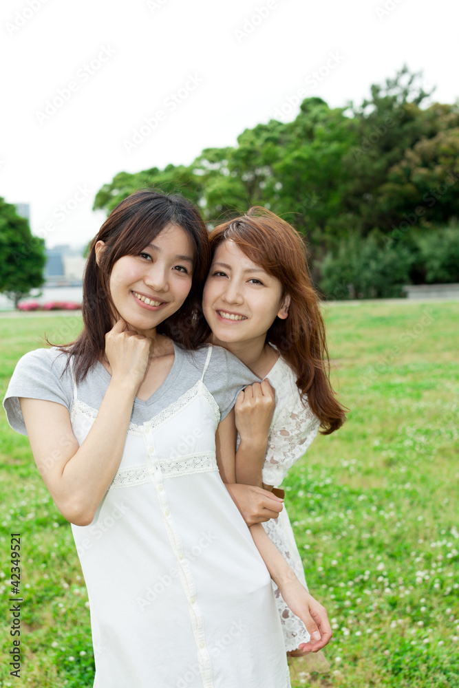 Beautiful young woman in the park. Portrait of asian. Beautiful young woman in the park. Portrait of asian.