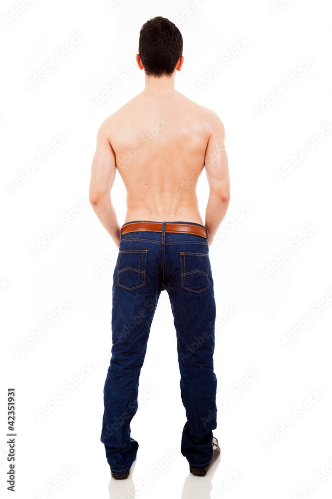 Young muscular male from the back, isolated on white background Young muscular male from the back, isolated on white background