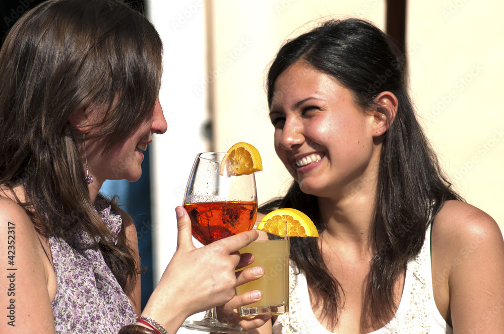 Two young While They Take a Cold Cocktail