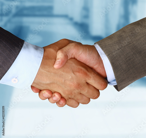 Two businessman shaking hands