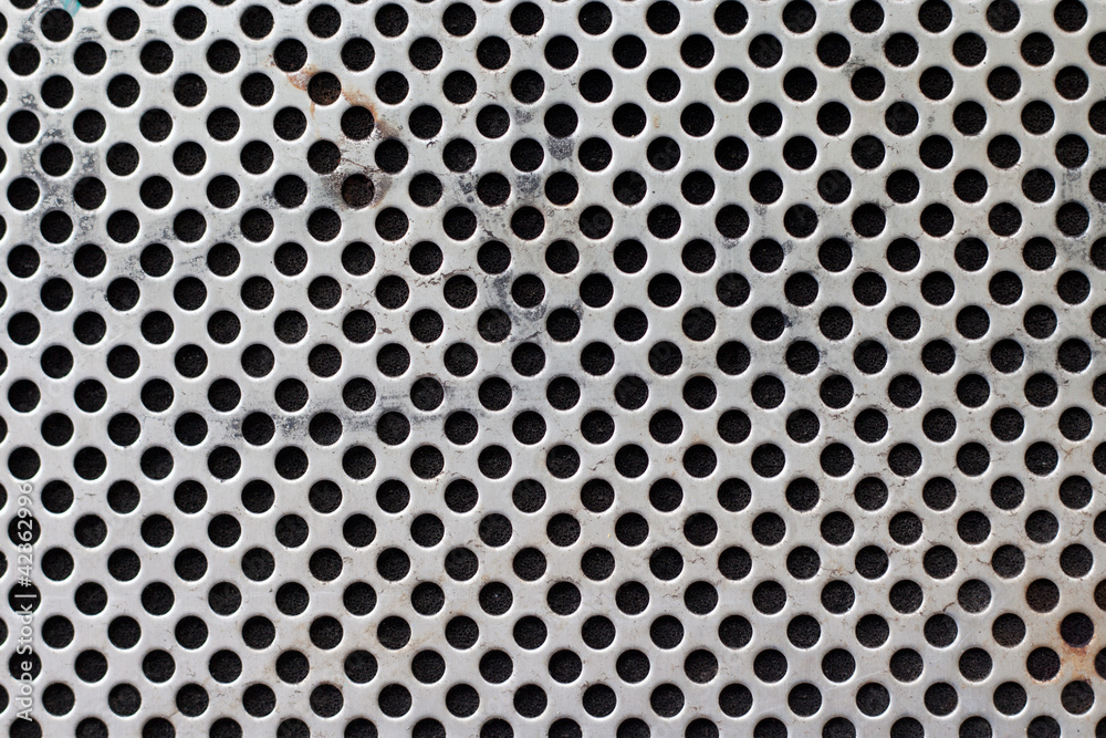 metal panel with holes background metal panel with holes background