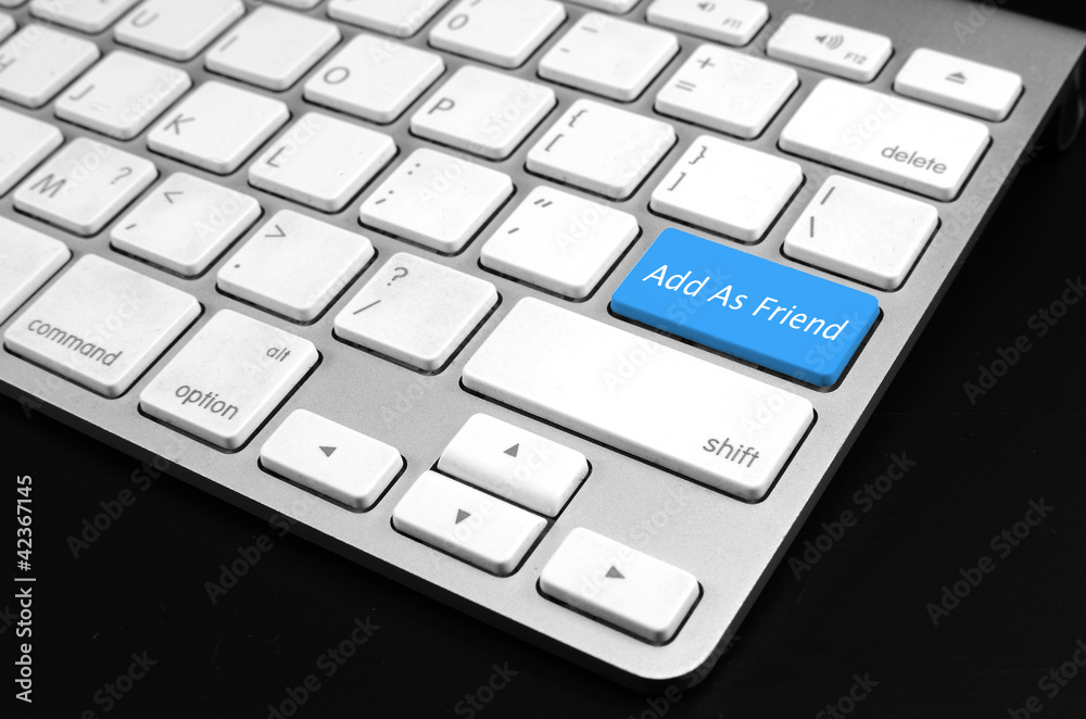Keyboard with blue Add As Friend button, social network concept Keyboard with blue Add As Friend button, social network concept