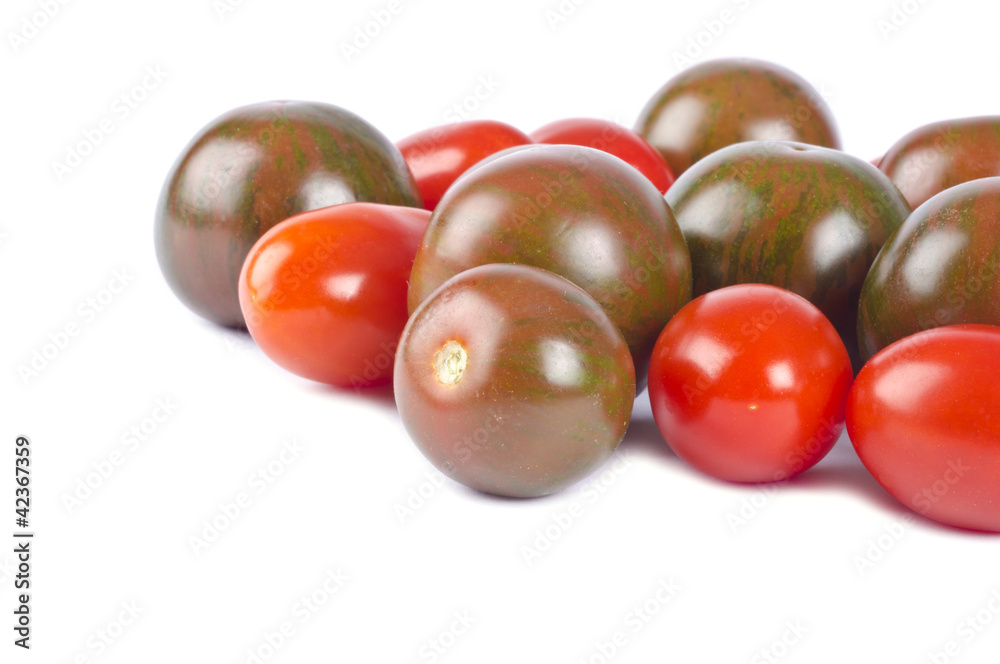 Zebra and Grape Cherry Tomatoes Isolated on White Zebra and Grape Cherry Tomatoes Isolated on White