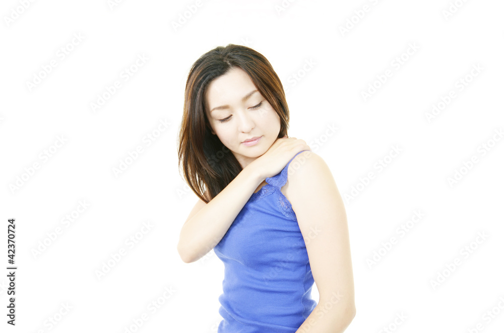 肩こりに悩む女性 肩こりに悩む女性