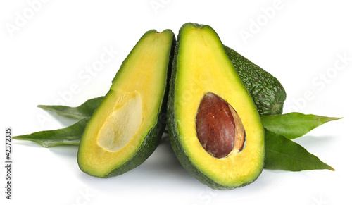 Ripe sliced avocado isolated