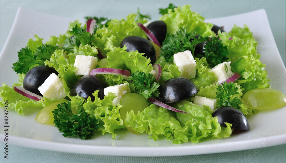 Salad of lettuce with cheese and grapes Salad of lettuce with cheese and grapes