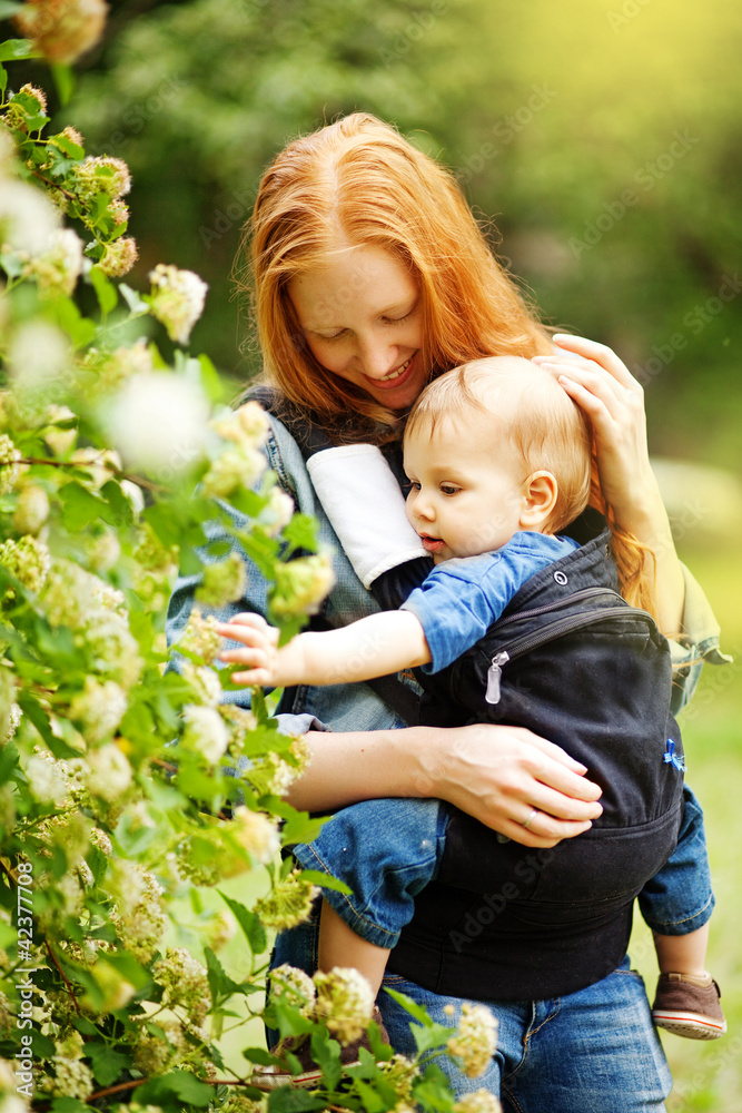 Ginger mother with baby
