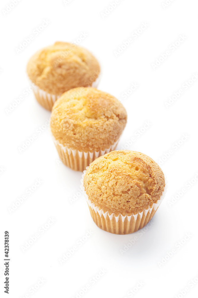 three muffins isolated on white three muffins isolated on white