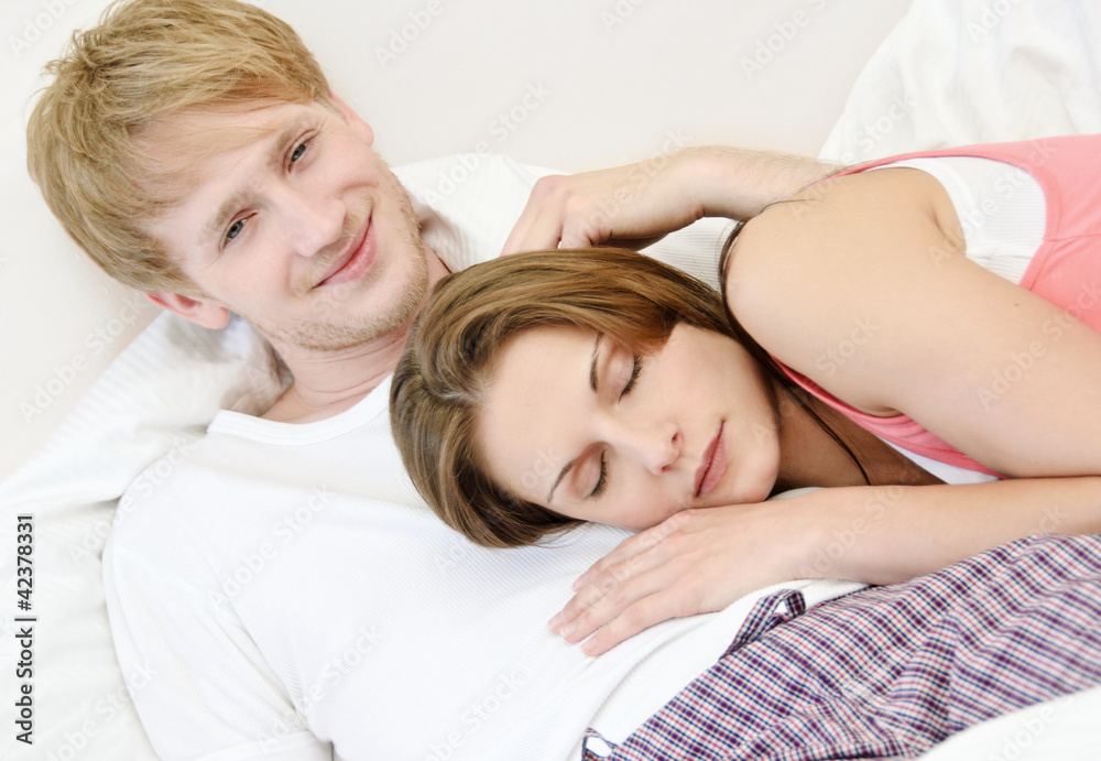 Young couple in love relaxing in a hotel room Young couple in love relaxing in a hotel room