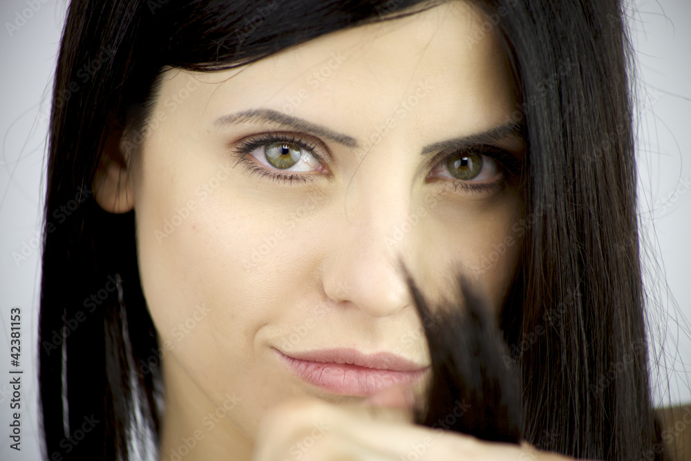 Portrait of beautiful female model showing split ends Portrait of beautiful female model showing split ends