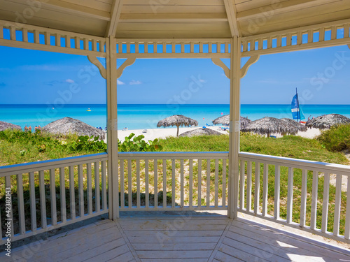 Tropical beach in Cuba seen from a typical house