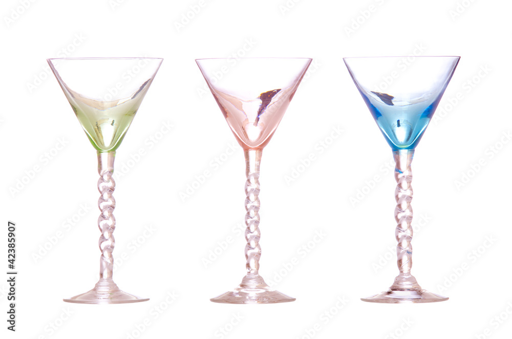 Line of colorful antique martini classes isolated on white Line of colorful antique martini classes isolated on white