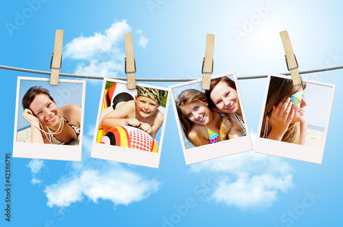 photos of holiday people hanging on clothesline
