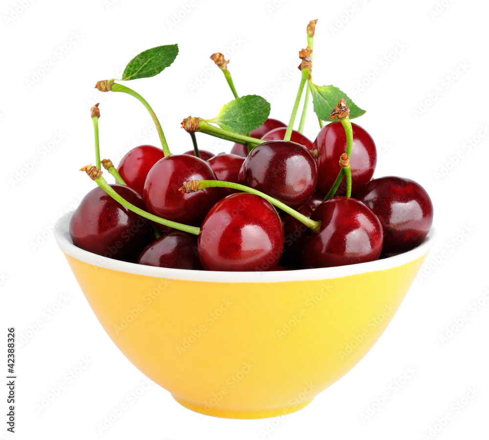 Cherry in bowl isolated on white background Cherry in bowl isolated on white background