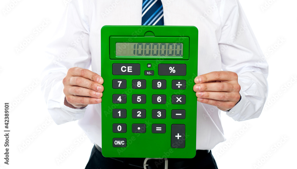 Closeup of a green calculator. Man holding it Closeup of a green calculator. Man holding it