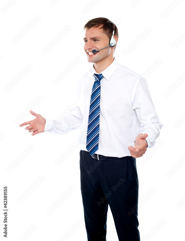 Smiling male operator explaining discounted offer Smiling male operator explaining discounted offer