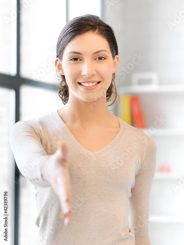 woman with an open hand ready for handshake Free Download woman with an open hand ready for handshake - GFXLoad