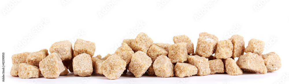 Lump brown cane sugar cubes isolated on white Lump brown cane sugar cubes isolated on white