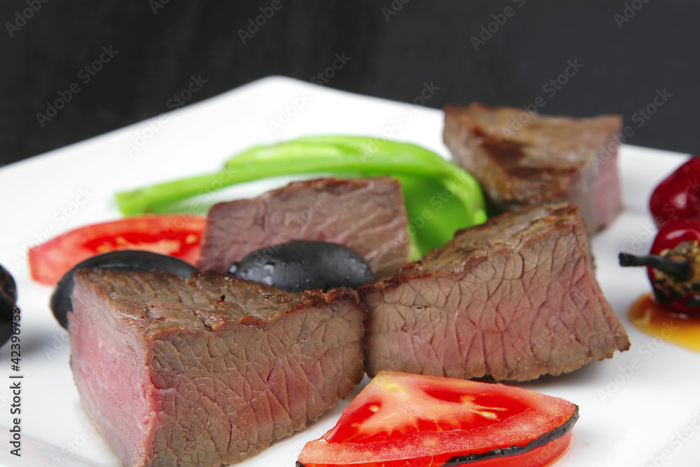 meat food : roasted fillet mignon on white plate
