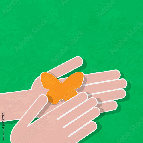 butterfly on the palm, green background
