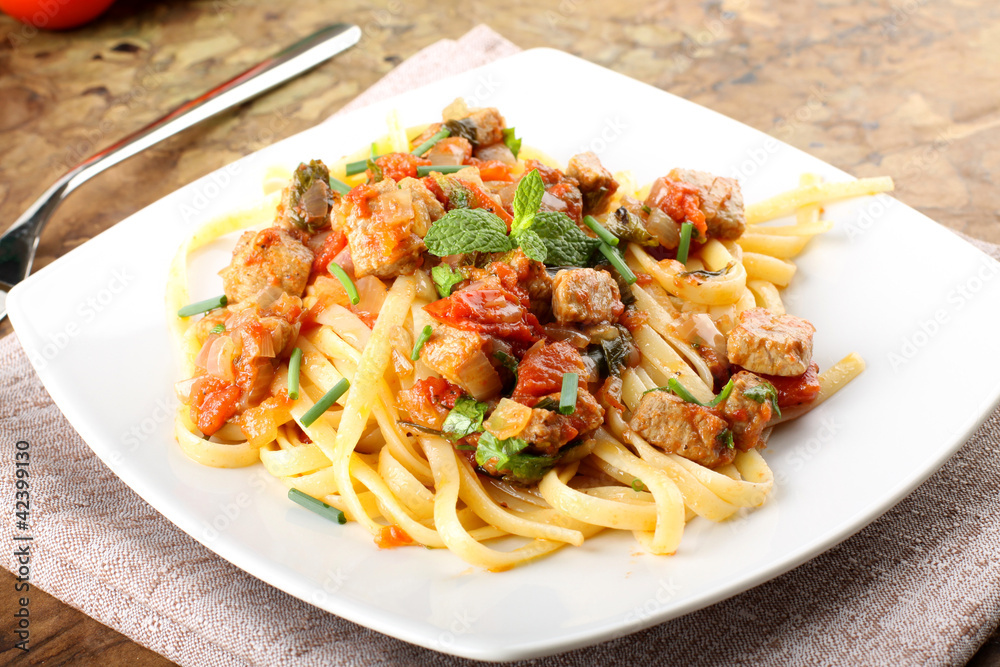 Pasta with chunks of fresh tuna, tomato and mint Pasta with chunks of fresh tuna, tomato and mint
