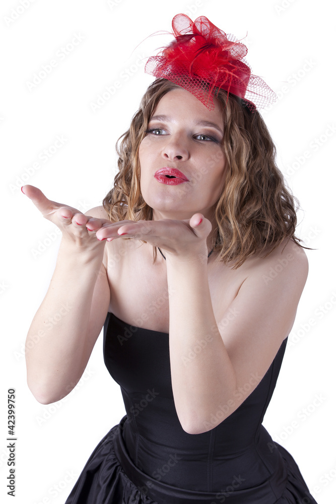 Portrait of sexy beautiful woman with red cap sending kiss Portrait of sexy beautiful woman with red cap sending kiss