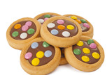 Biscuits with milk chocolate and coloured chocolate beans isolat