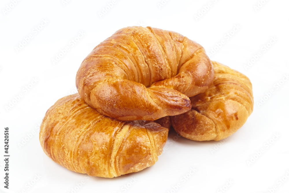 Fresh and tasty croissant isolated on white background