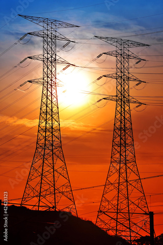 Scenery of silhouetted electrical tower
