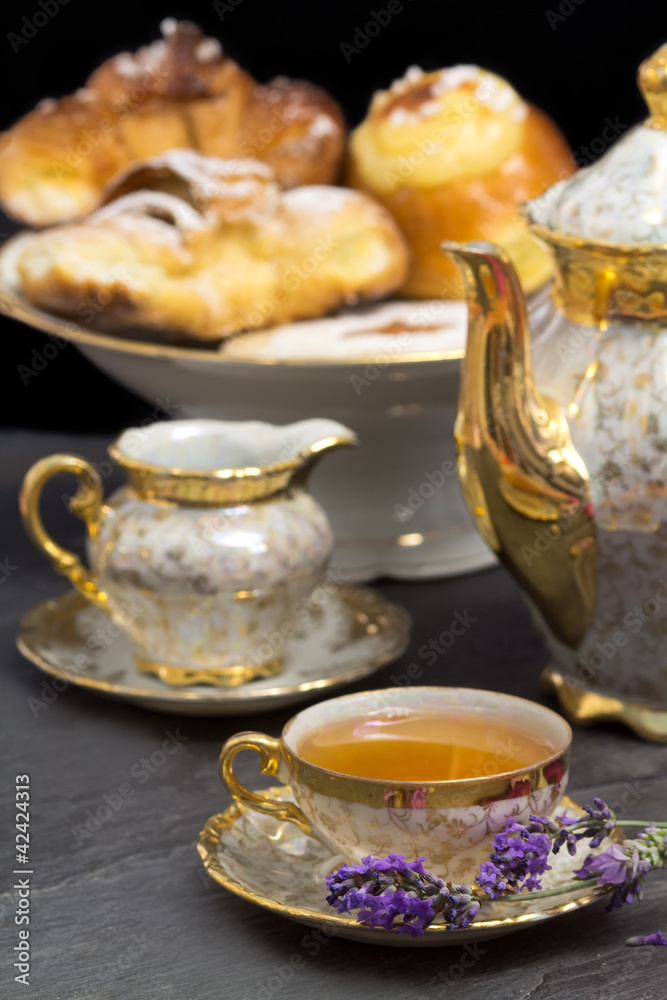 lavender flavored tea with teapot and sweets lavender flavored tea with teapot and sweets