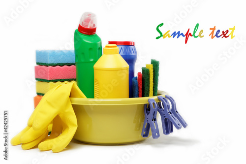 Capacity with cleaning supplies isolated on white background.