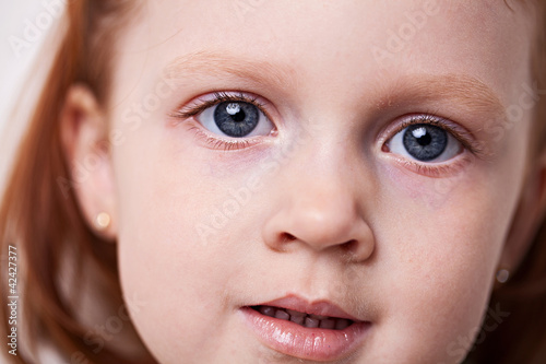 happy little girl in studio