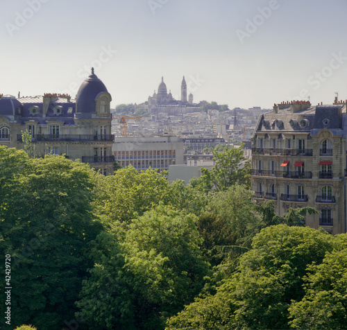 Billede på lærred Vue de la butte Montmartre depuis les buttes chaumont - Paris