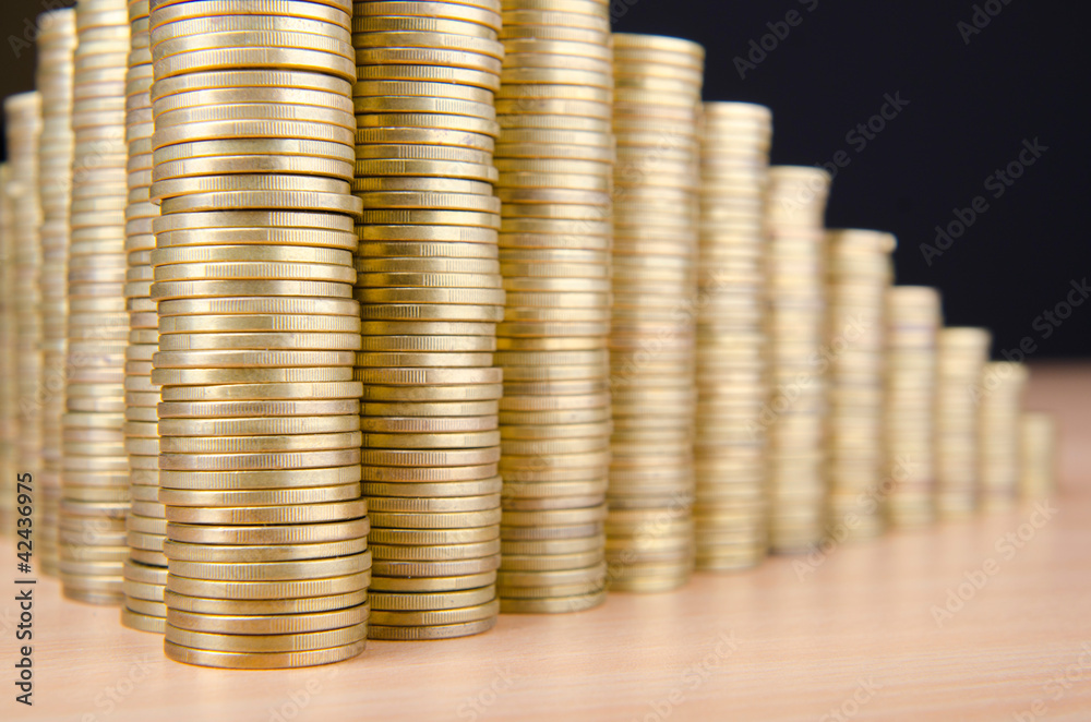 Golden coins in high stacks Golden coins in high stacks