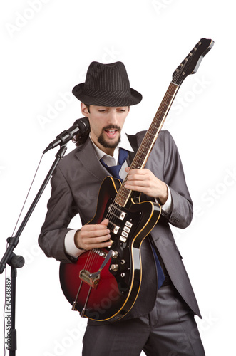 Businessman playing the guitar on white