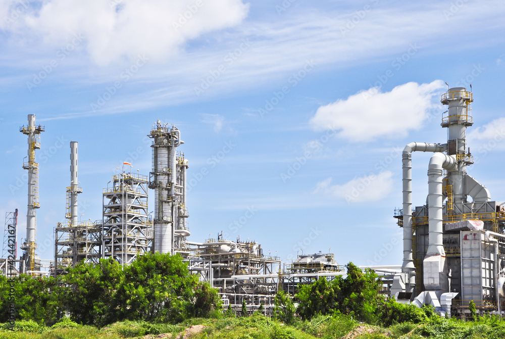 Obraz premium Chemical industrial with light of blue sky 