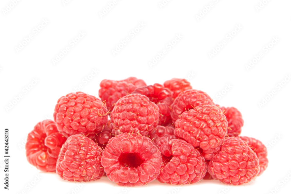 Fresh Raspberries Closeup on a white background. Fresh Raspberries Closeup on a white background.