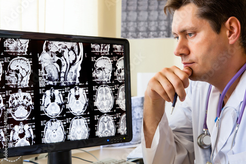 Doctor looking at ct scan