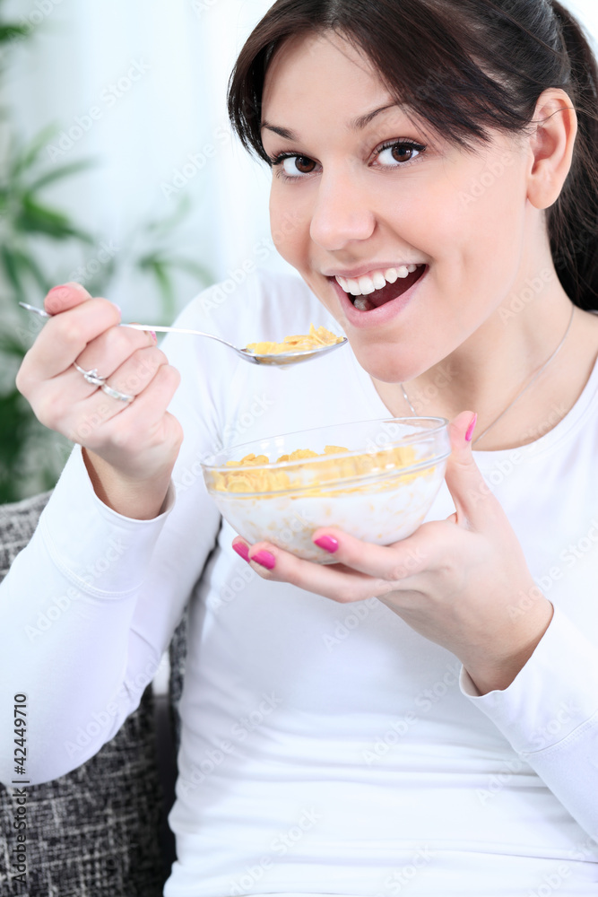 Young girl having a healthy breakfast Young girl having a healthy breakfast