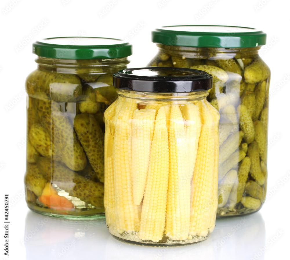 Jars of canned vegetables isolated on white Jars of canned vegetables isolated on white