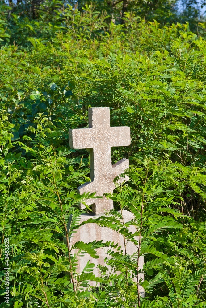 old stone monument on a grave